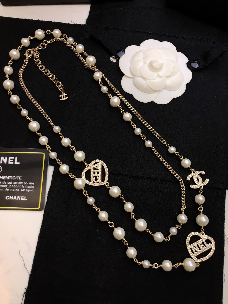 Chanel Pearl Necklace with CC and Heart Charms