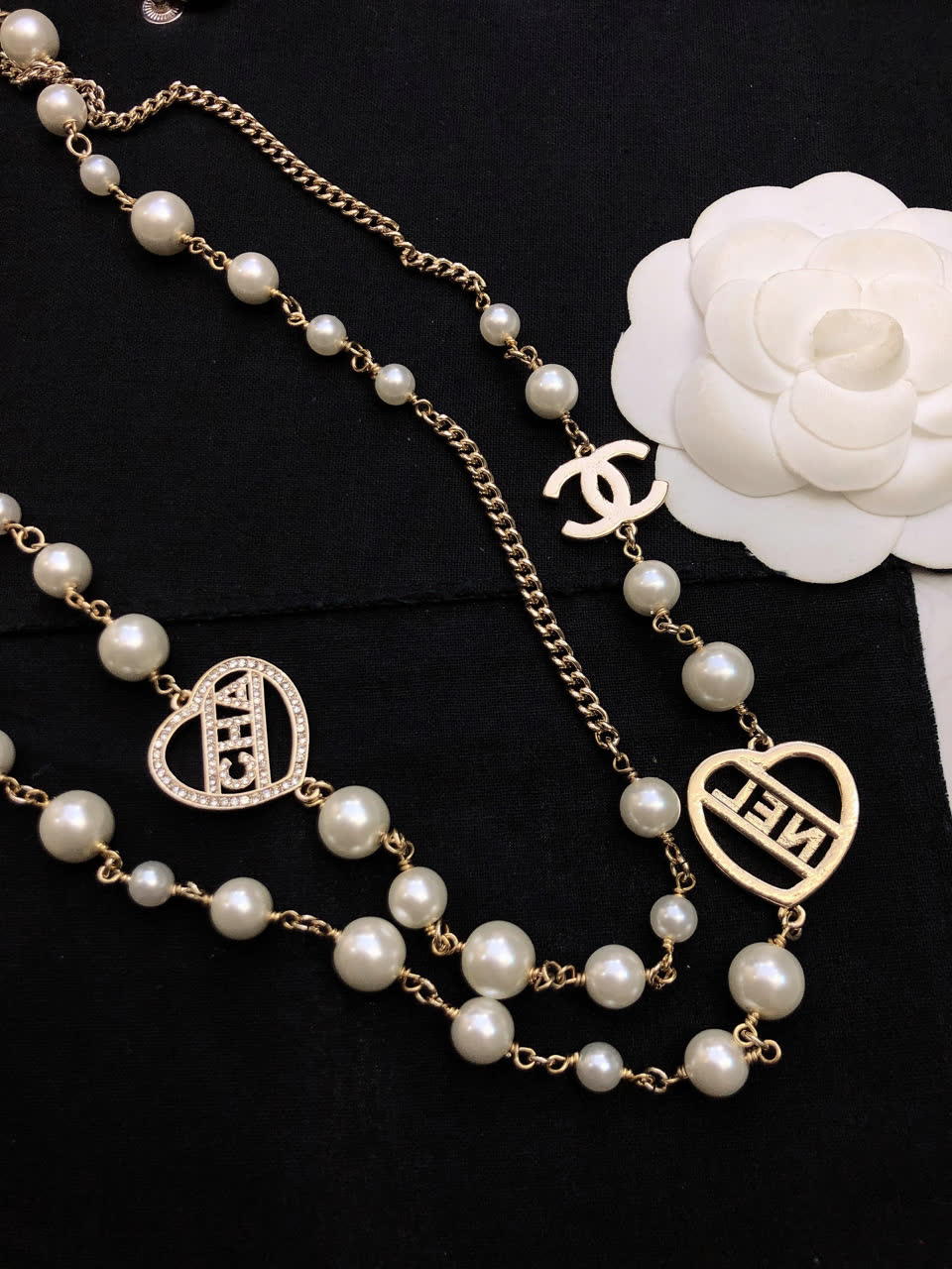 Chanel Pearl Necklace with CC and Heart Charms