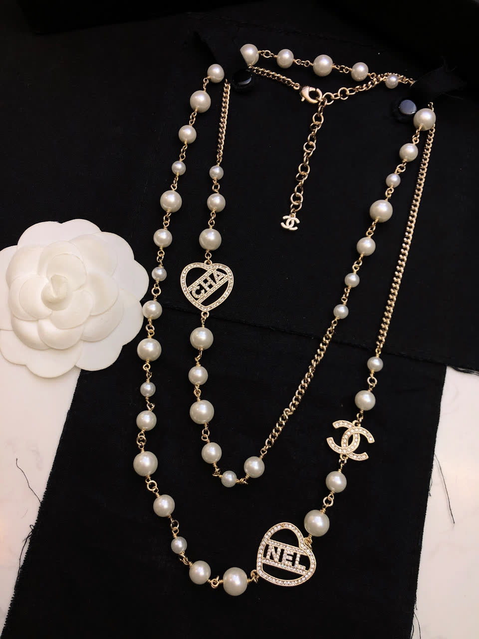 Chanel Pearl Necklace with CC and Heart Charms