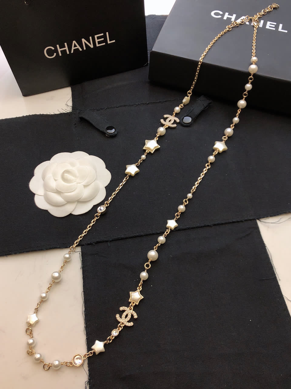 Chanel Pearl and Star Charm Necklace