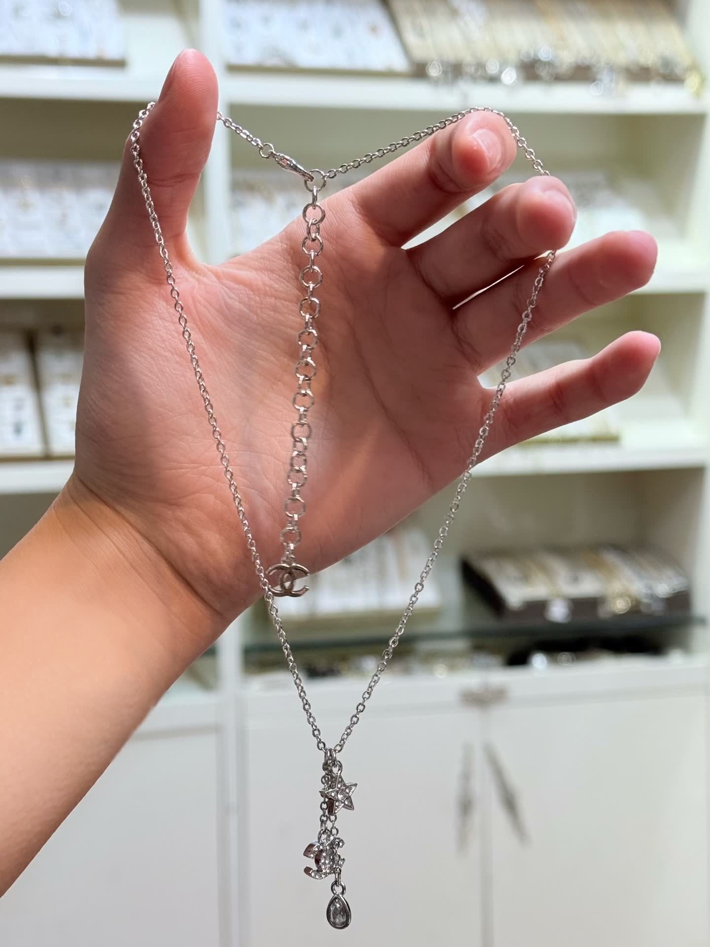 Chanel Silver Necklace with Star and CC Logo Charm