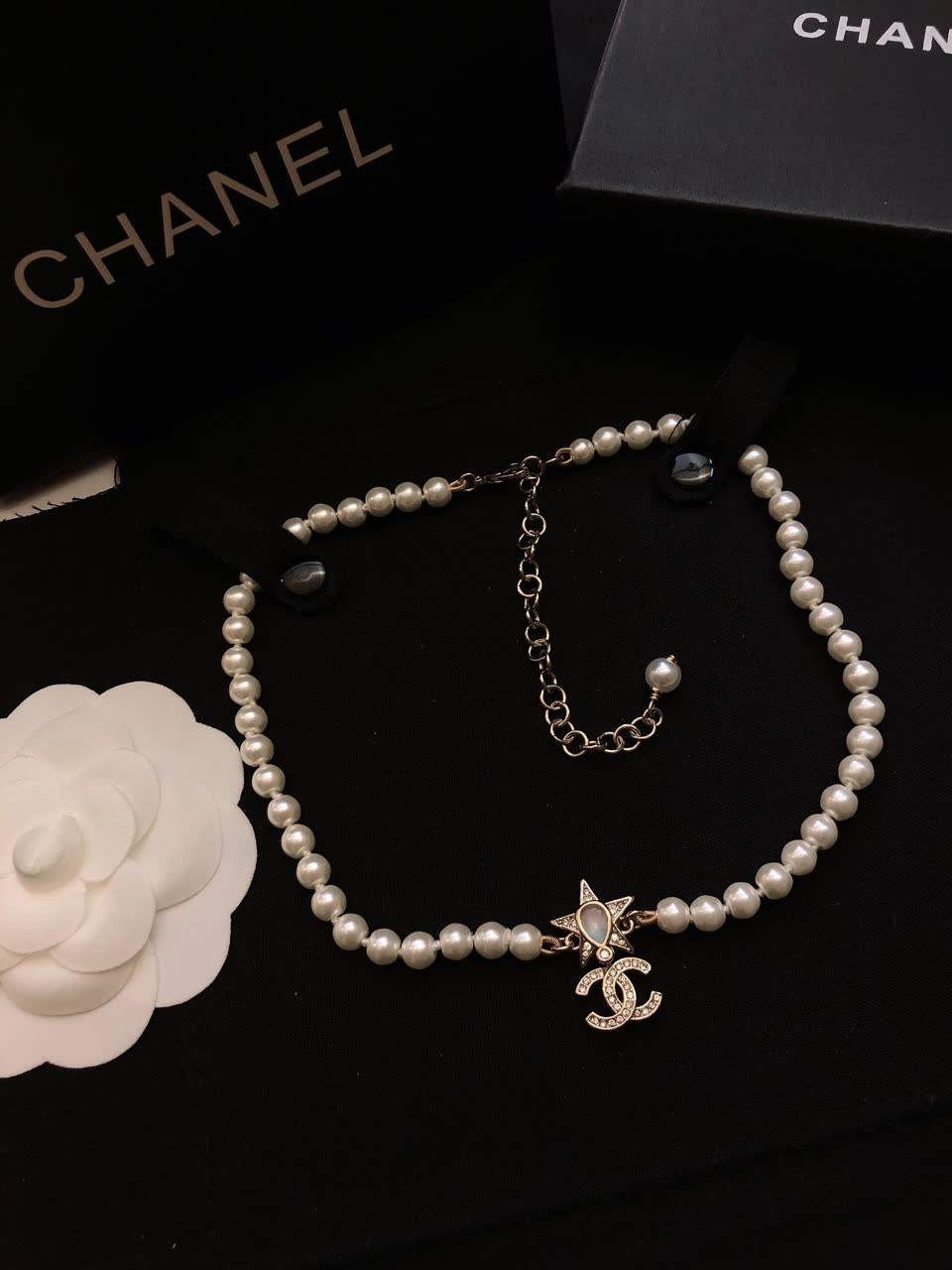 Chanel Pearl Necklace with CC Logo and Star Design