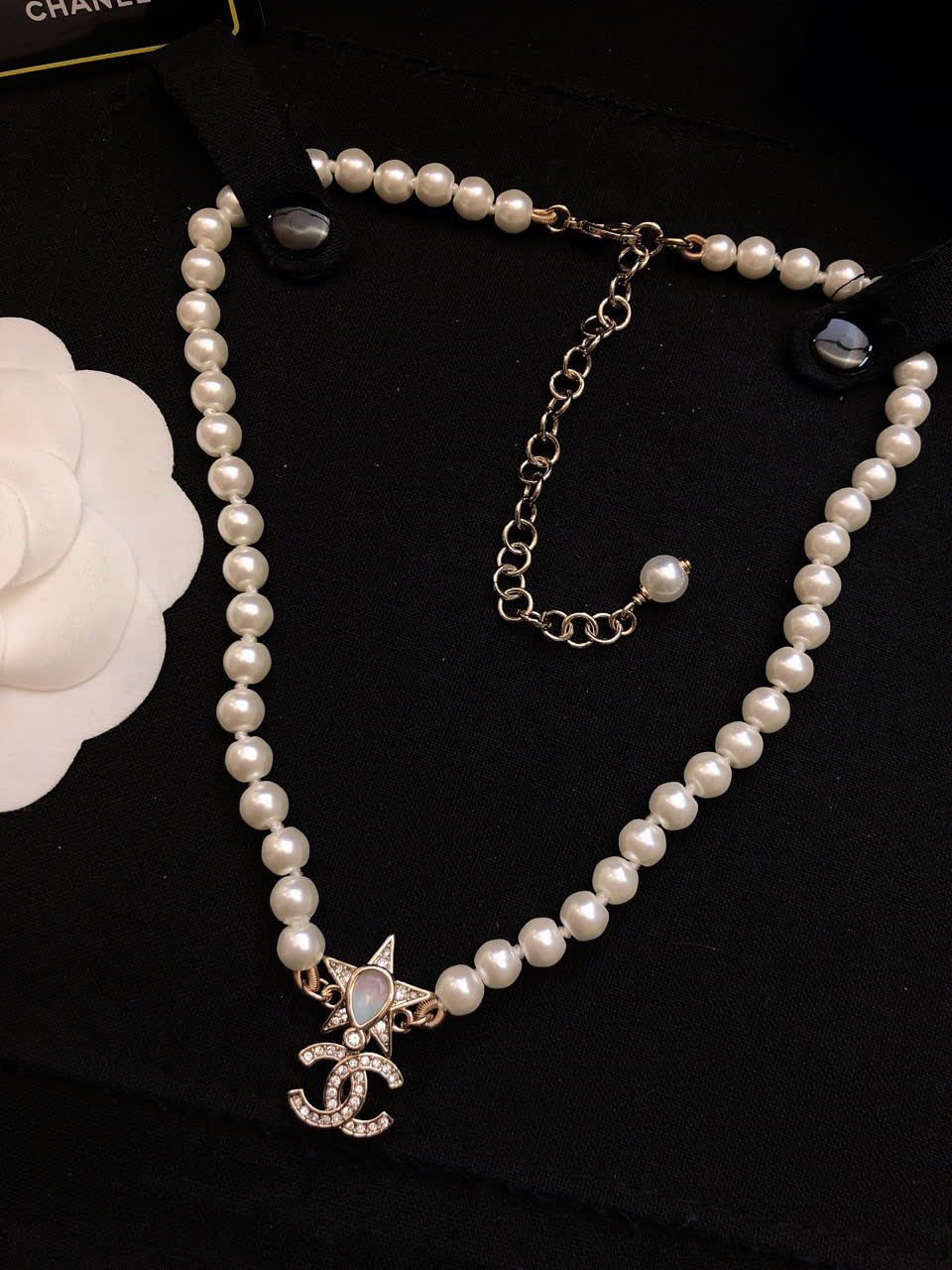 Chanel Pearl Necklace with CC Logo and Star Design