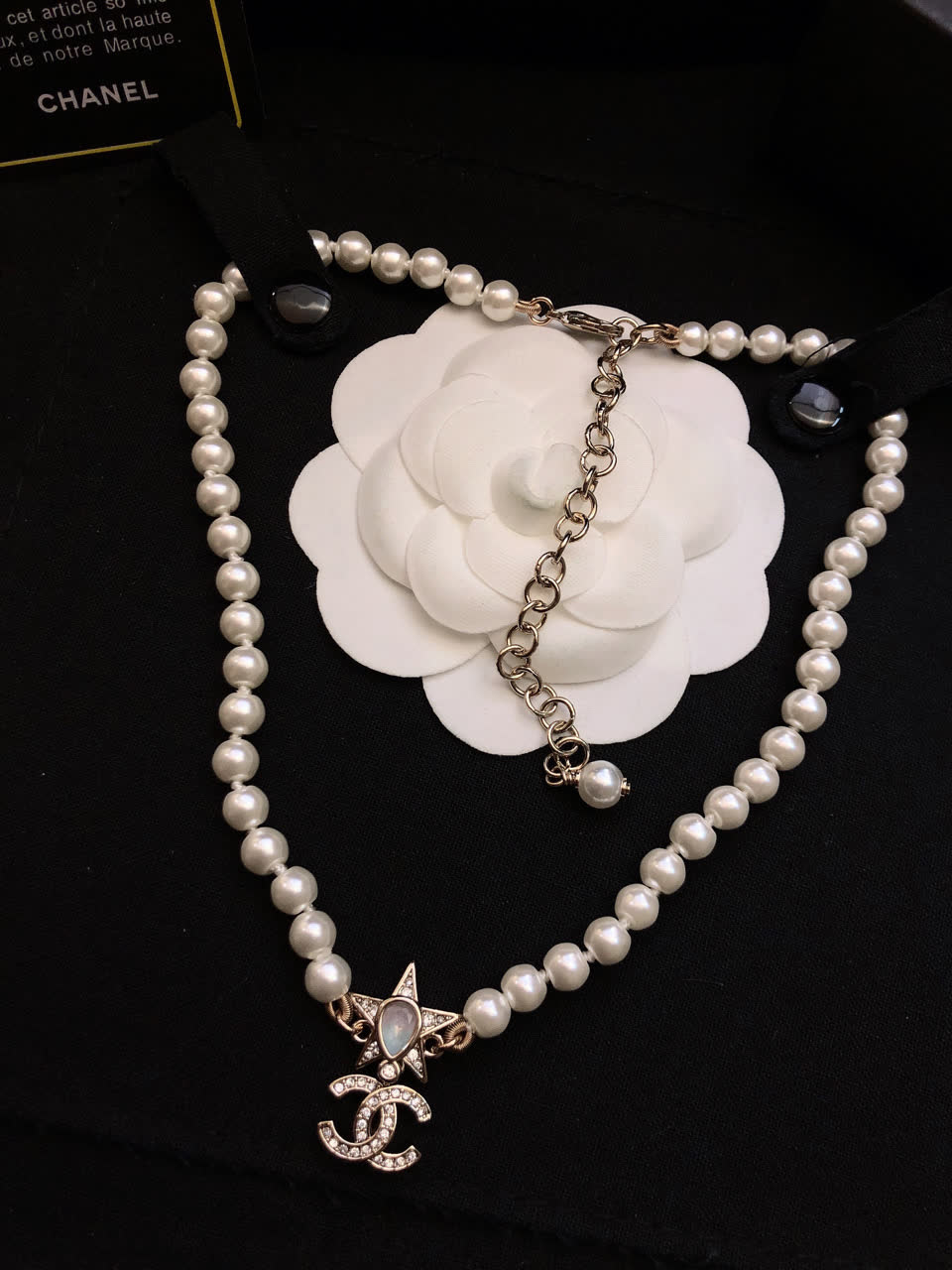 Chanel Pearl Necklace with CC Logo and Star Design
