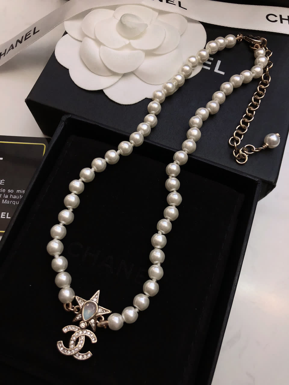 Chanel Pearl Necklace with CC Logo and Star Design