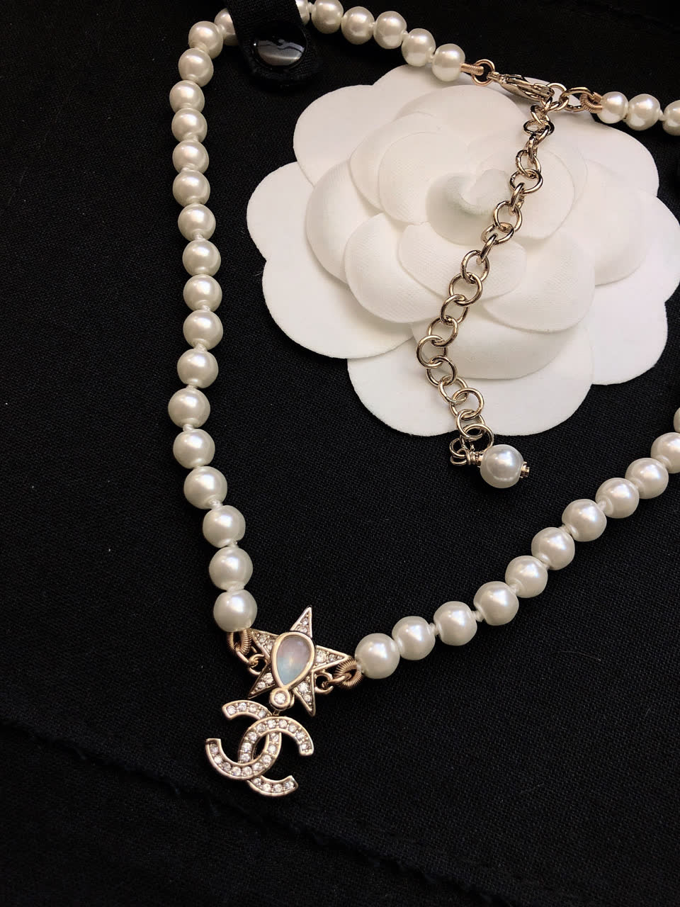 Chanel Pearl Necklace with CC Logo and Star Design