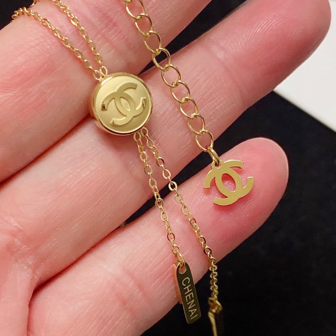 Chanel Gold Tone CC Logo Lariat Necklace