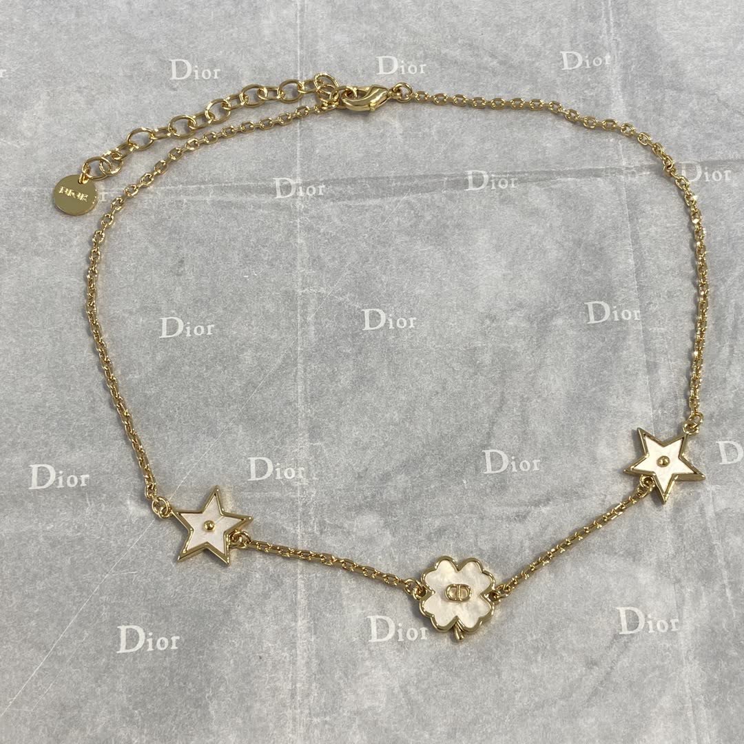 Van Cleef & Arpels Necklace - Star and Flower Design