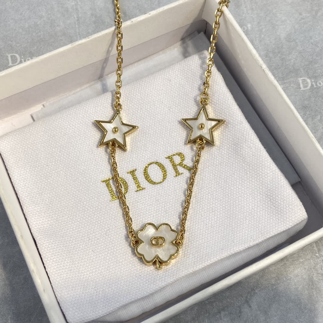 Van Cleef & Arpels Necklace - Star and Flower Design