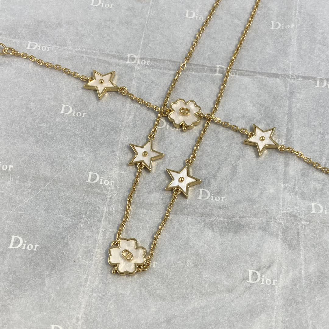 Van Cleef & Arpels Necklace - Star and Flower Design