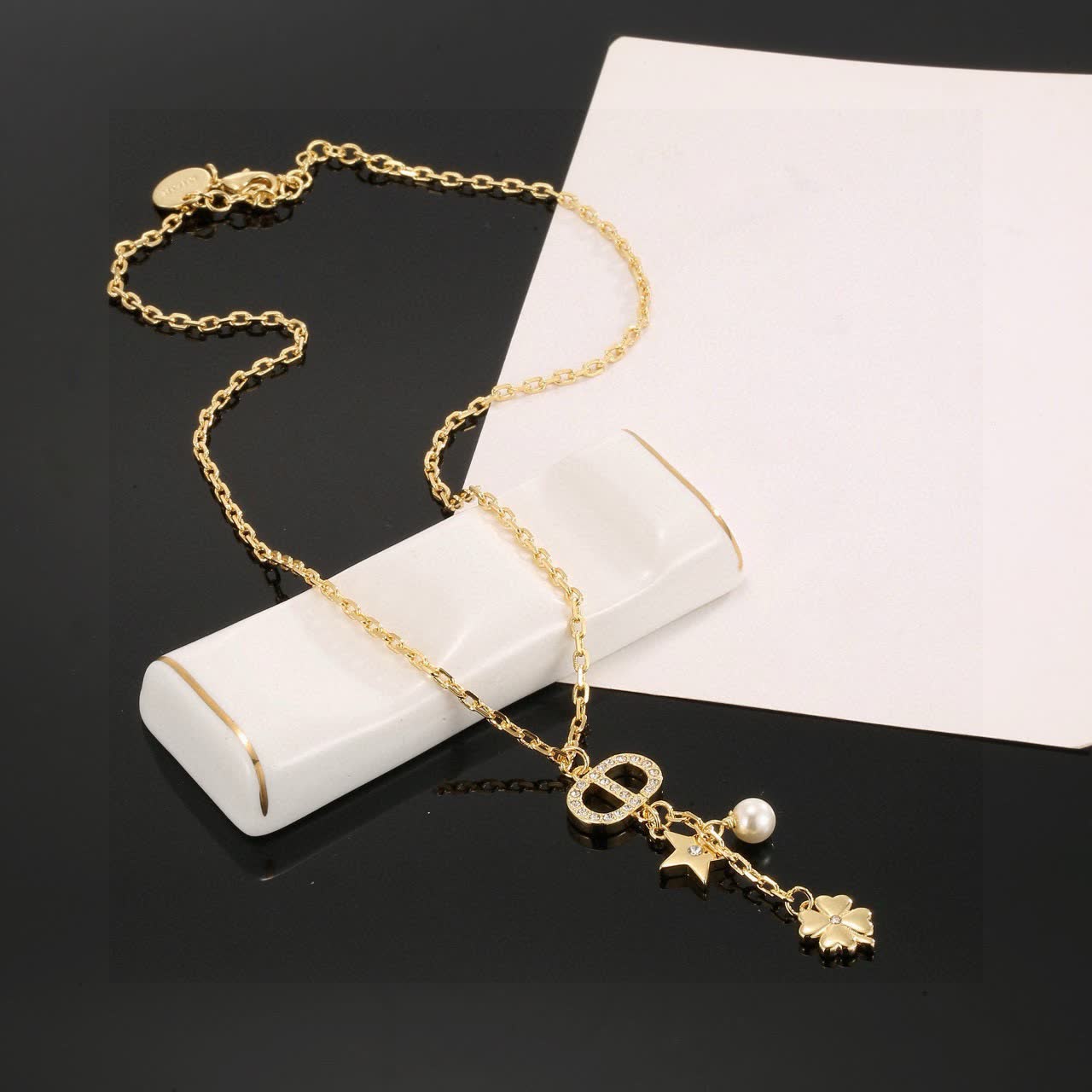 Chanel Gold-tone Necklace with Pearl and Clover Charm