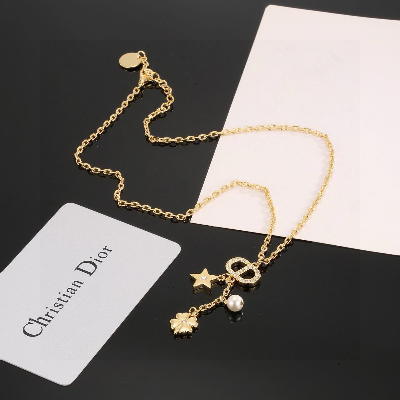 Chanel Gold-tone Necklace with Pearl and Clover Charm