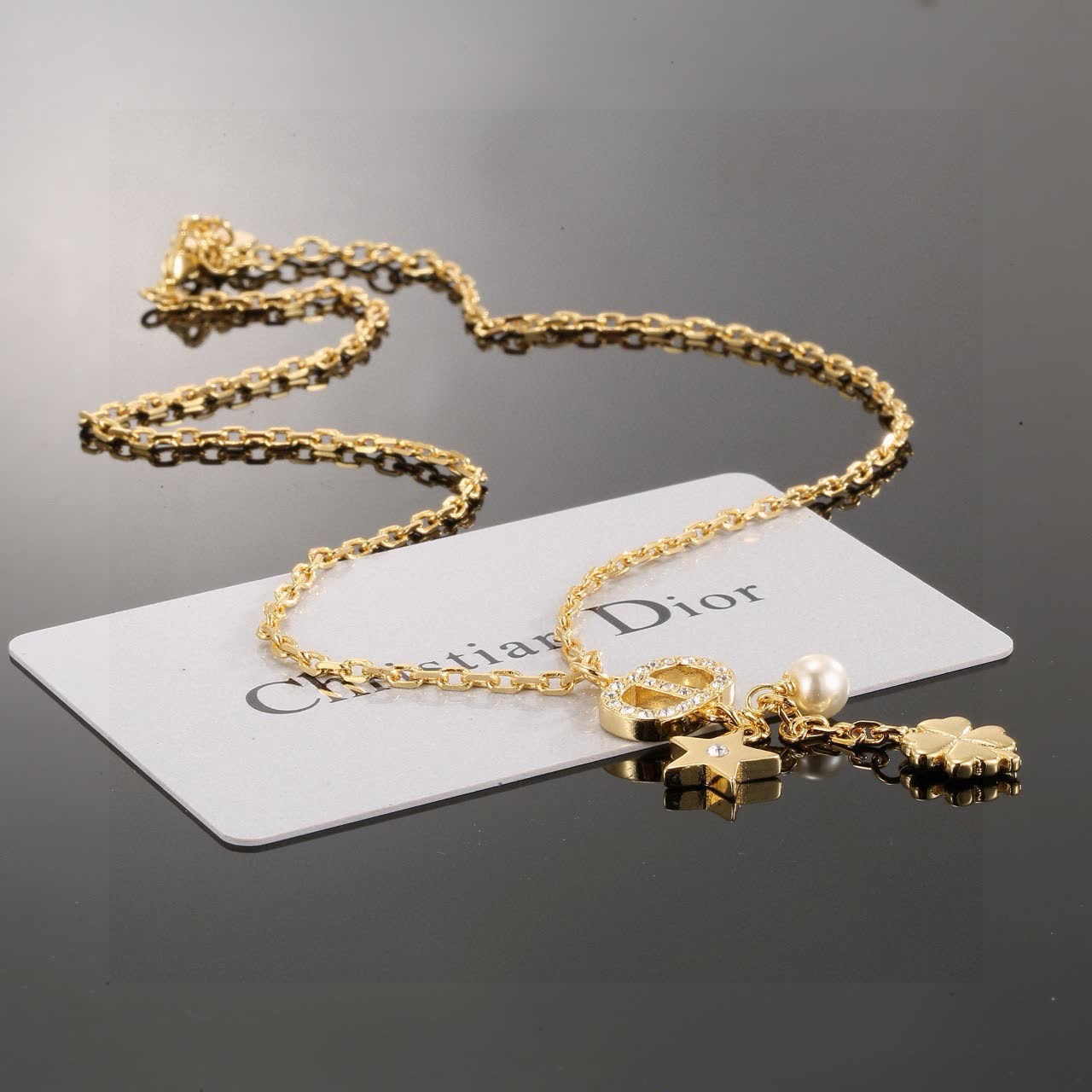 Chanel Gold-tone Necklace with Pearl and Clover Charm