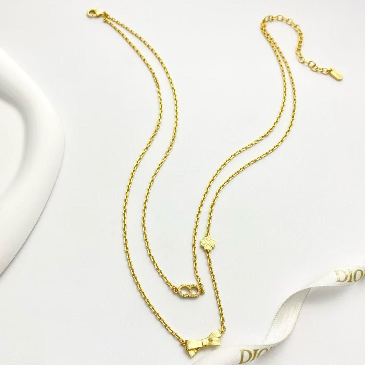Dior Gold-Tone Necklace with Bow and Clover Charms