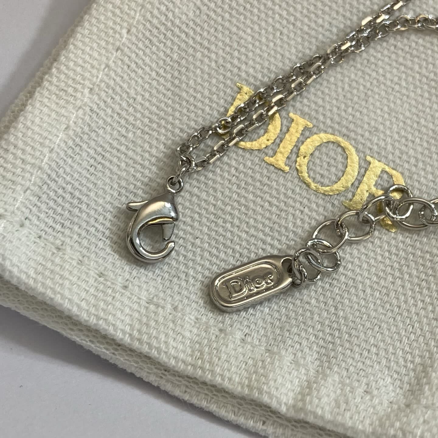 Dior Silver Tone Necklace with Logo Charms