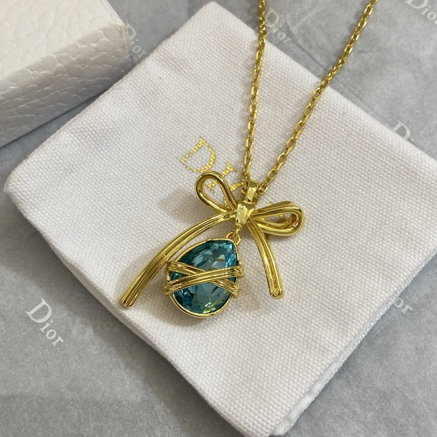 Dior Gold Plated Blue Crystal Bow Pendant Necklace Dior Gold Plated Blue Crystal Bow Pendant Necklace