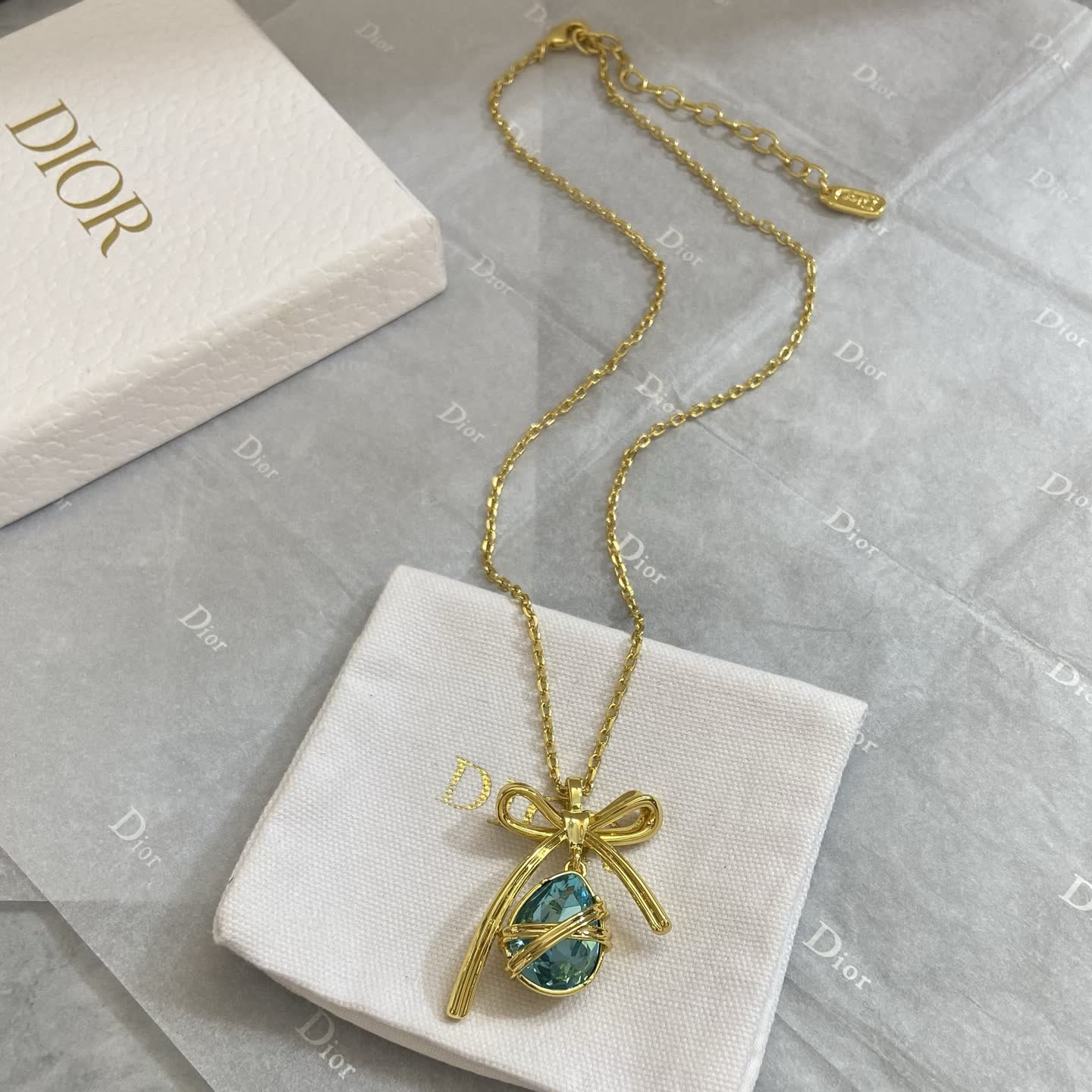 Dior Gold Plated Blue Crystal Bow Pendant Necklace