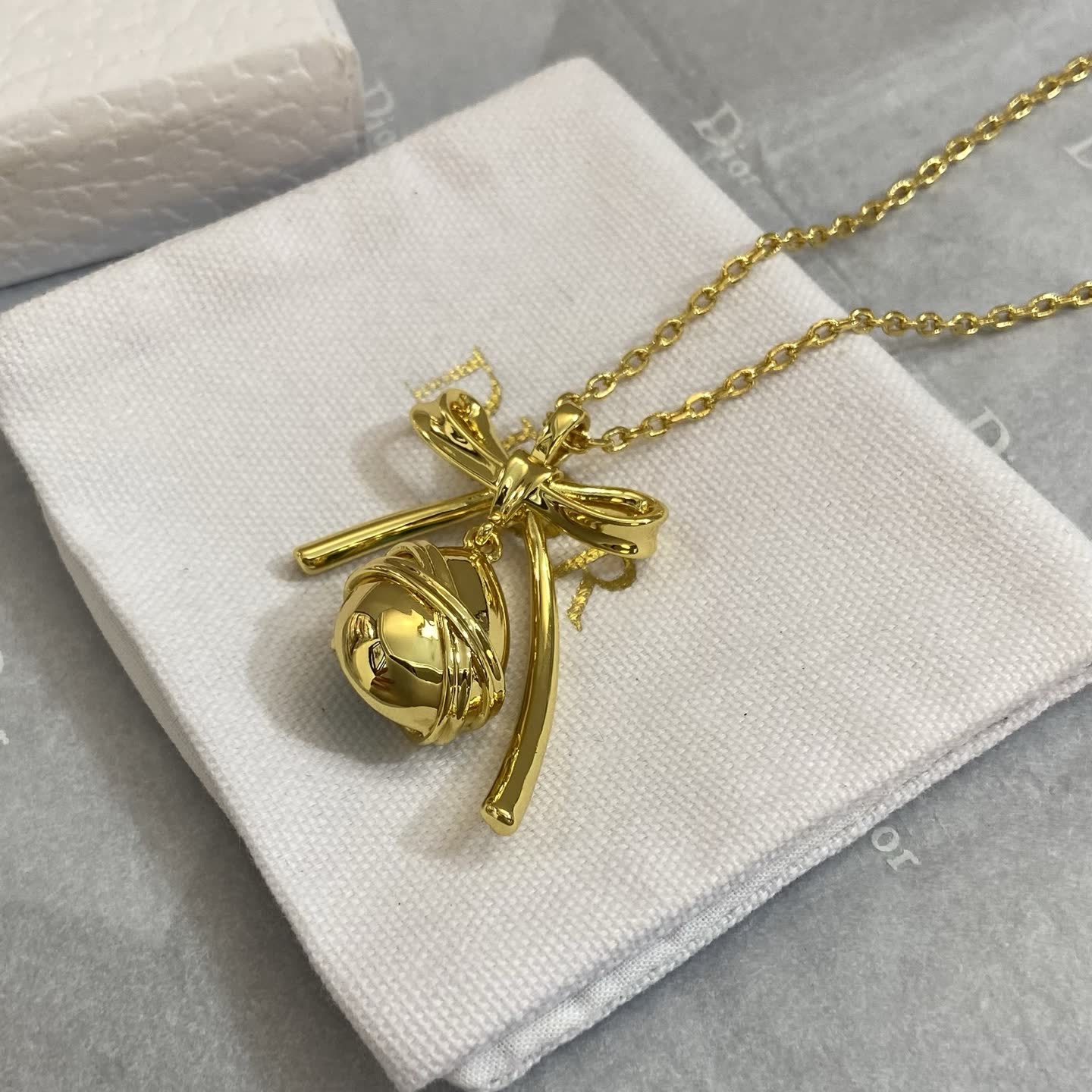 Dior Gold Plated Blue Crystal Bow Pendant Necklace