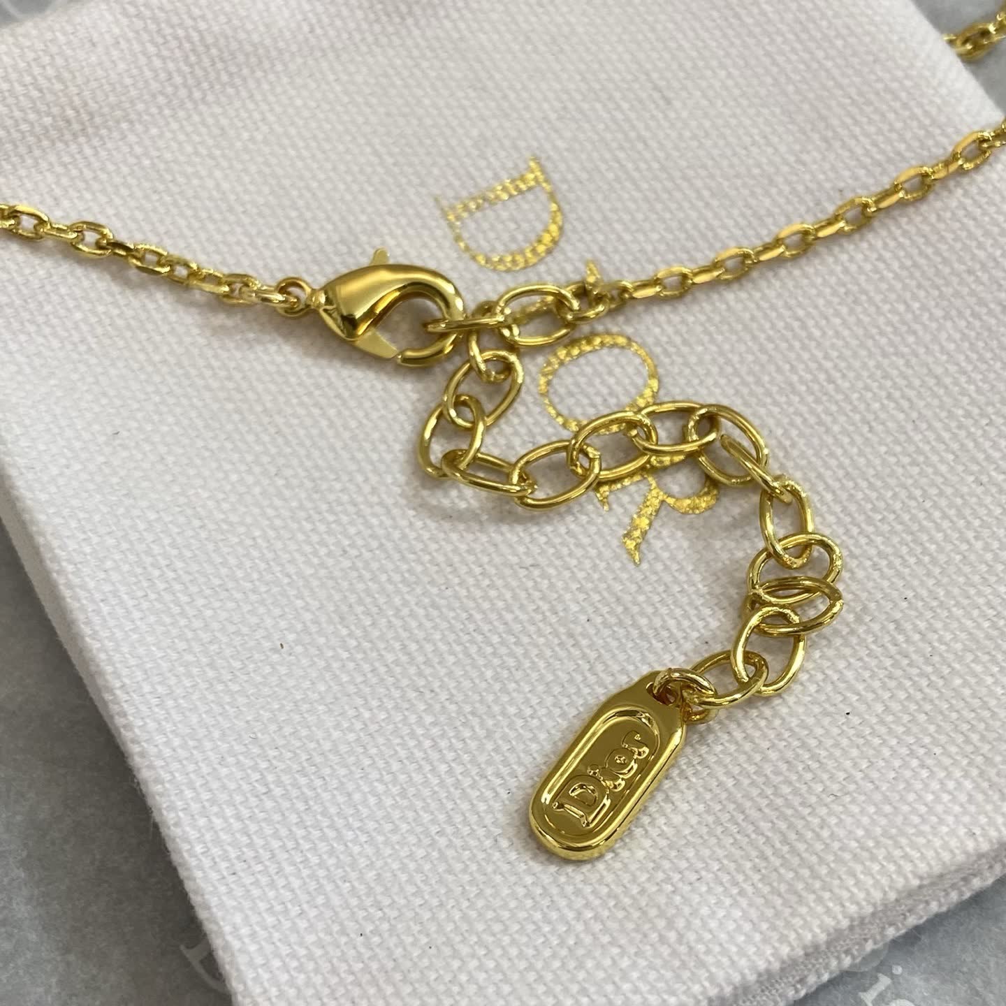 Dior Gold Plated Blue Crystal Bow Pendant Necklace
