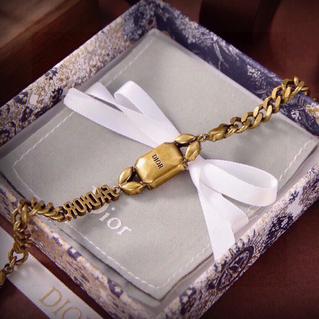 Dior Bracelet with Gold Chain and Gemstones