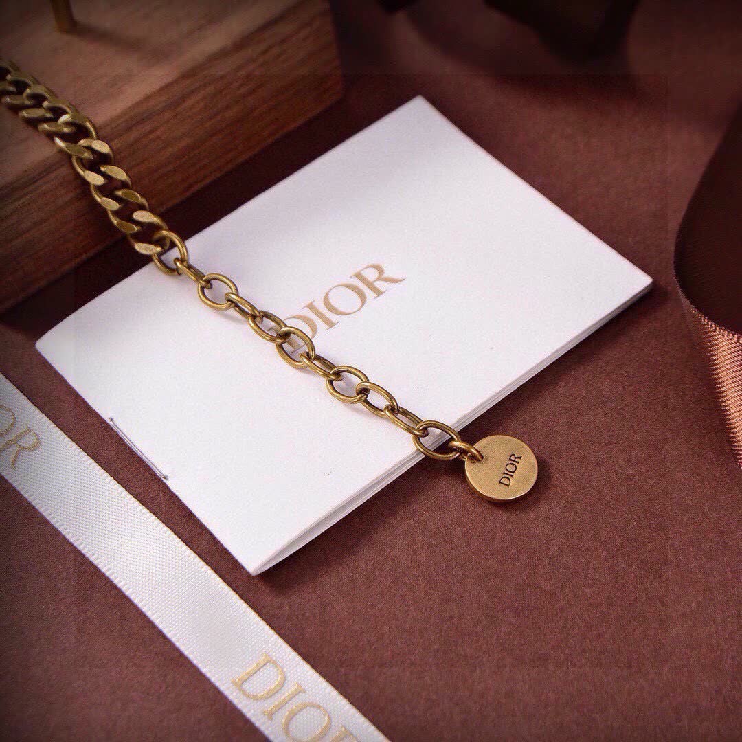 Dior Bracelet with Gold Chain and Gemstones