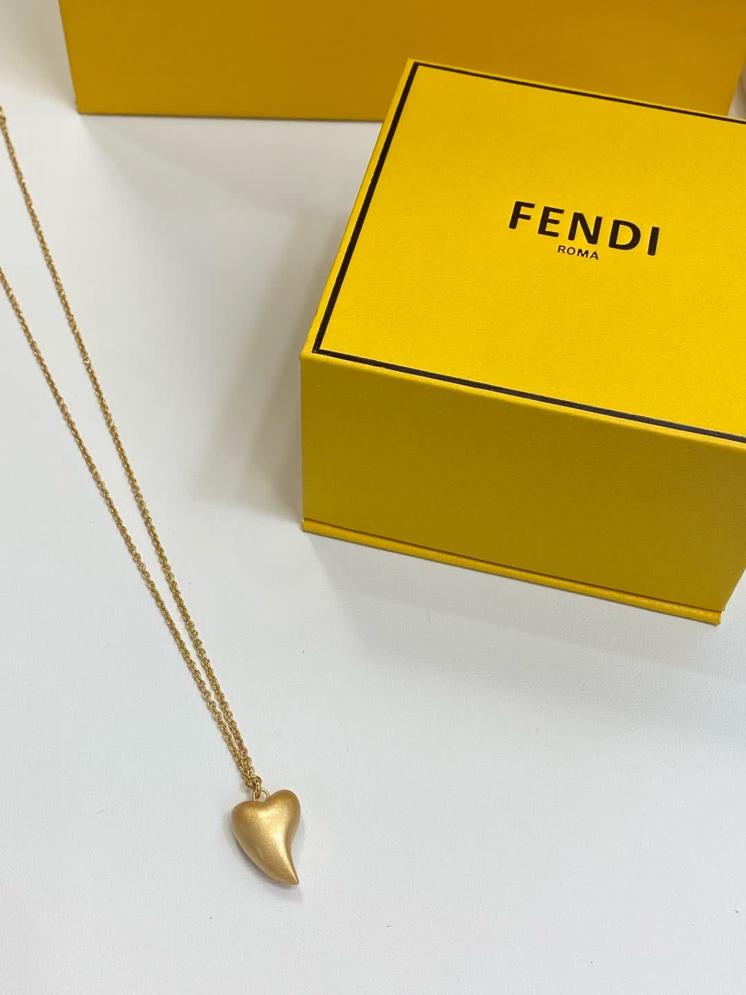 Fendi Roma Gold Tone Heart Pendant Necklace