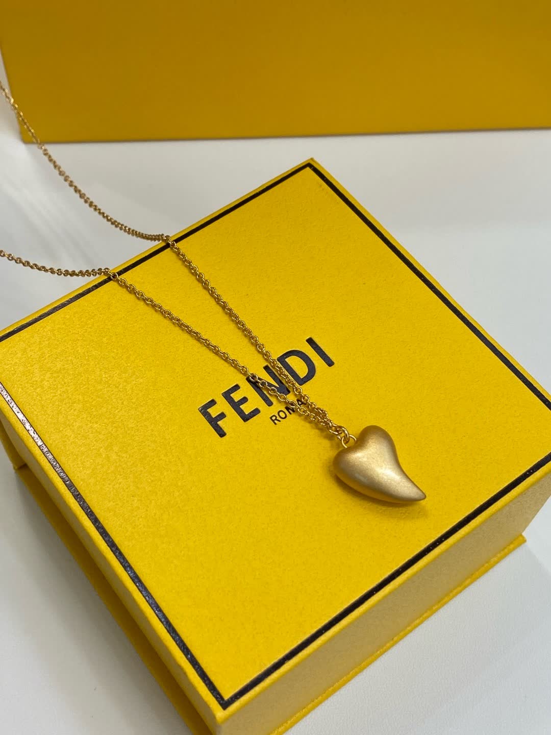 Fendi Roma Gold Tone Heart Pendant Necklace