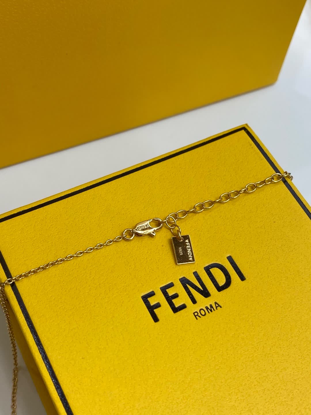 Fendi Roma Gold Tone Heart Pendant Necklace