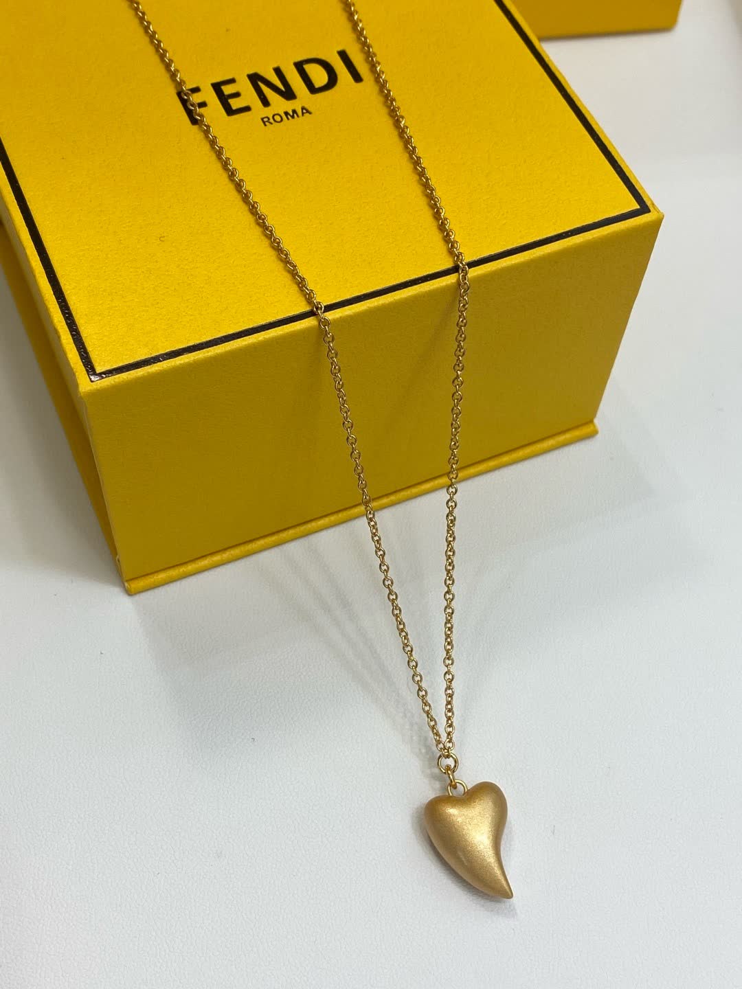 Fendi Roma Gold Tone Heart Pendant Necklace