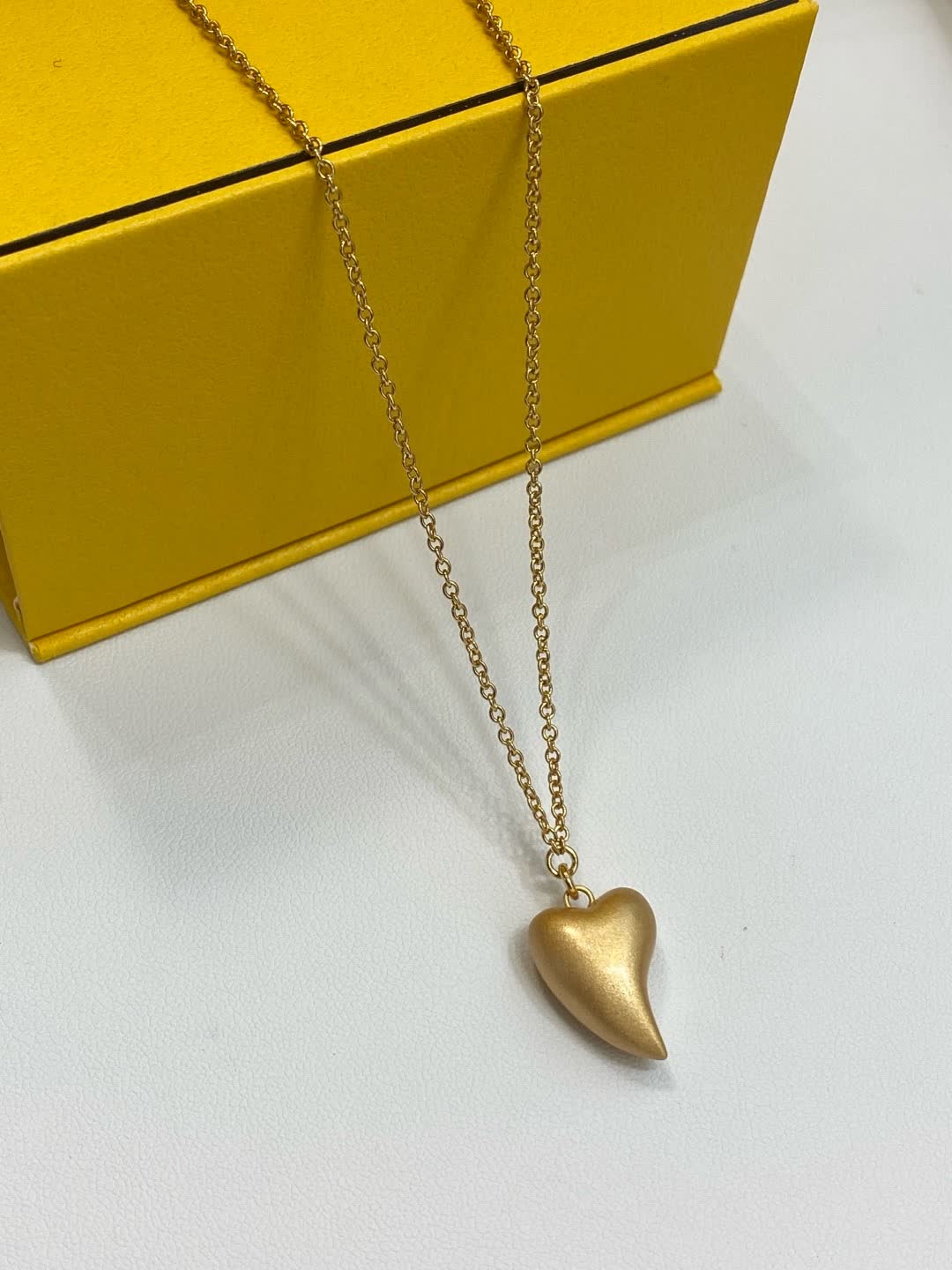 Fendi Roma Gold Tone Heart Pendant Necklace