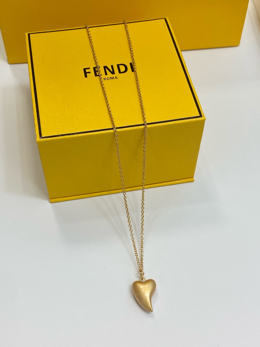 Fendi Roma Gold Tone Heart Pendant Necklace