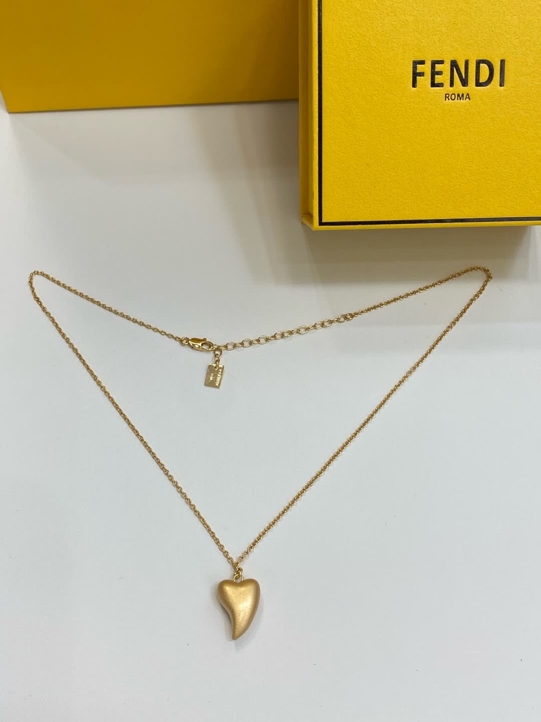 Fendi Roma Gold Tone Heart Pendant Necklace