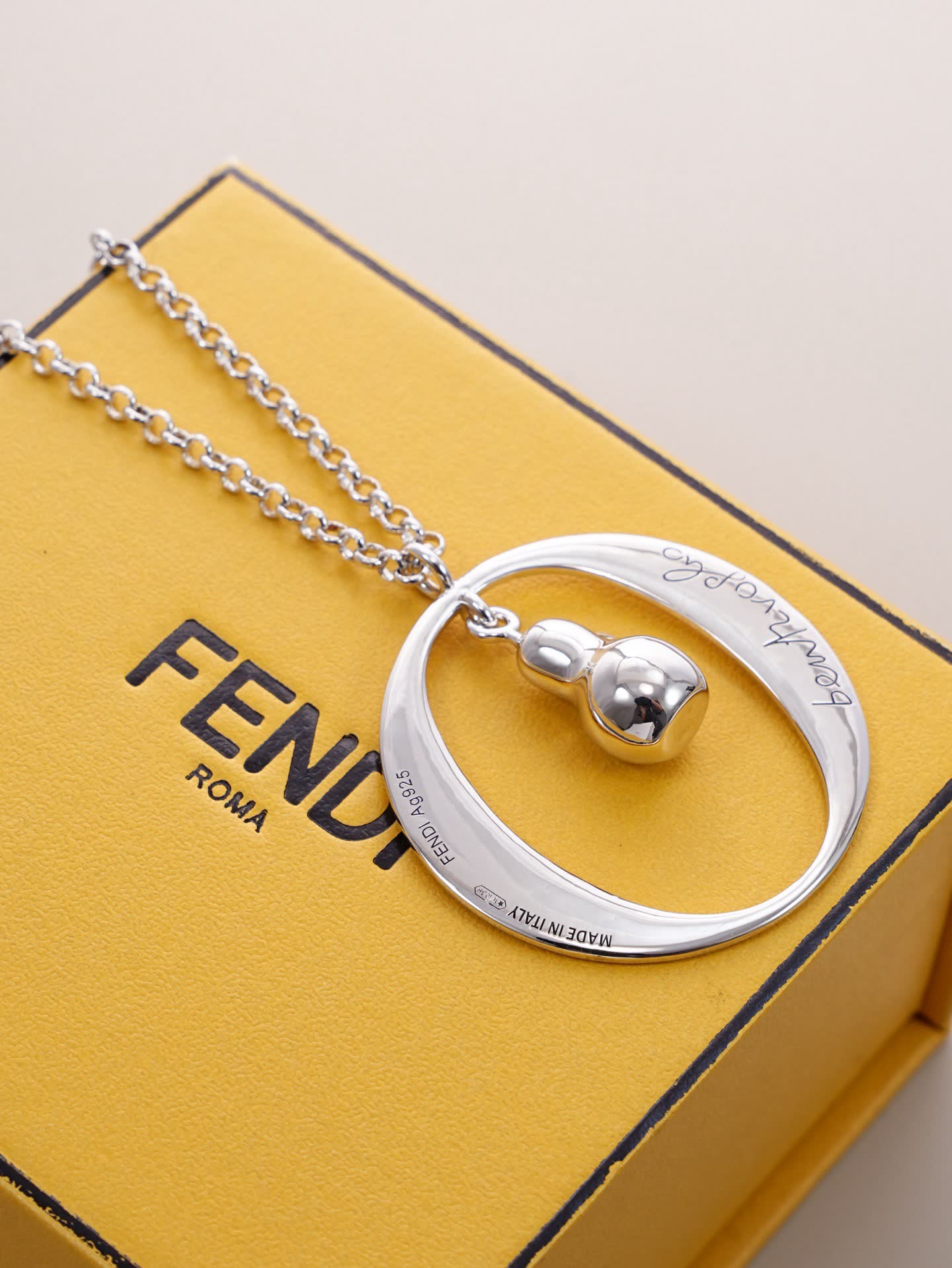 Fendi Silver 'bentvolve' Necklace with Logo Charm