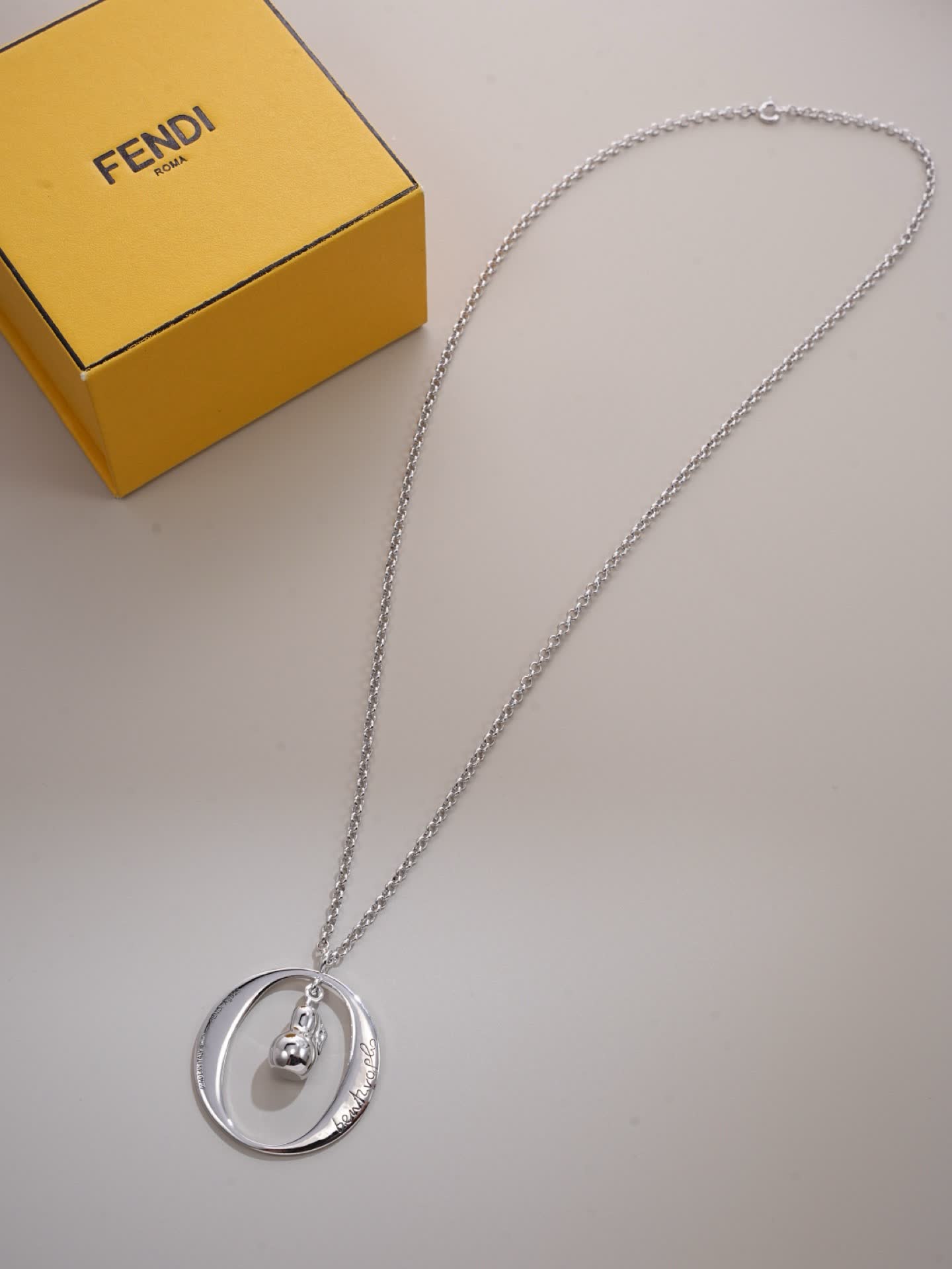 Fendi Silver 'bentvolve' Necklace with Logo Charm