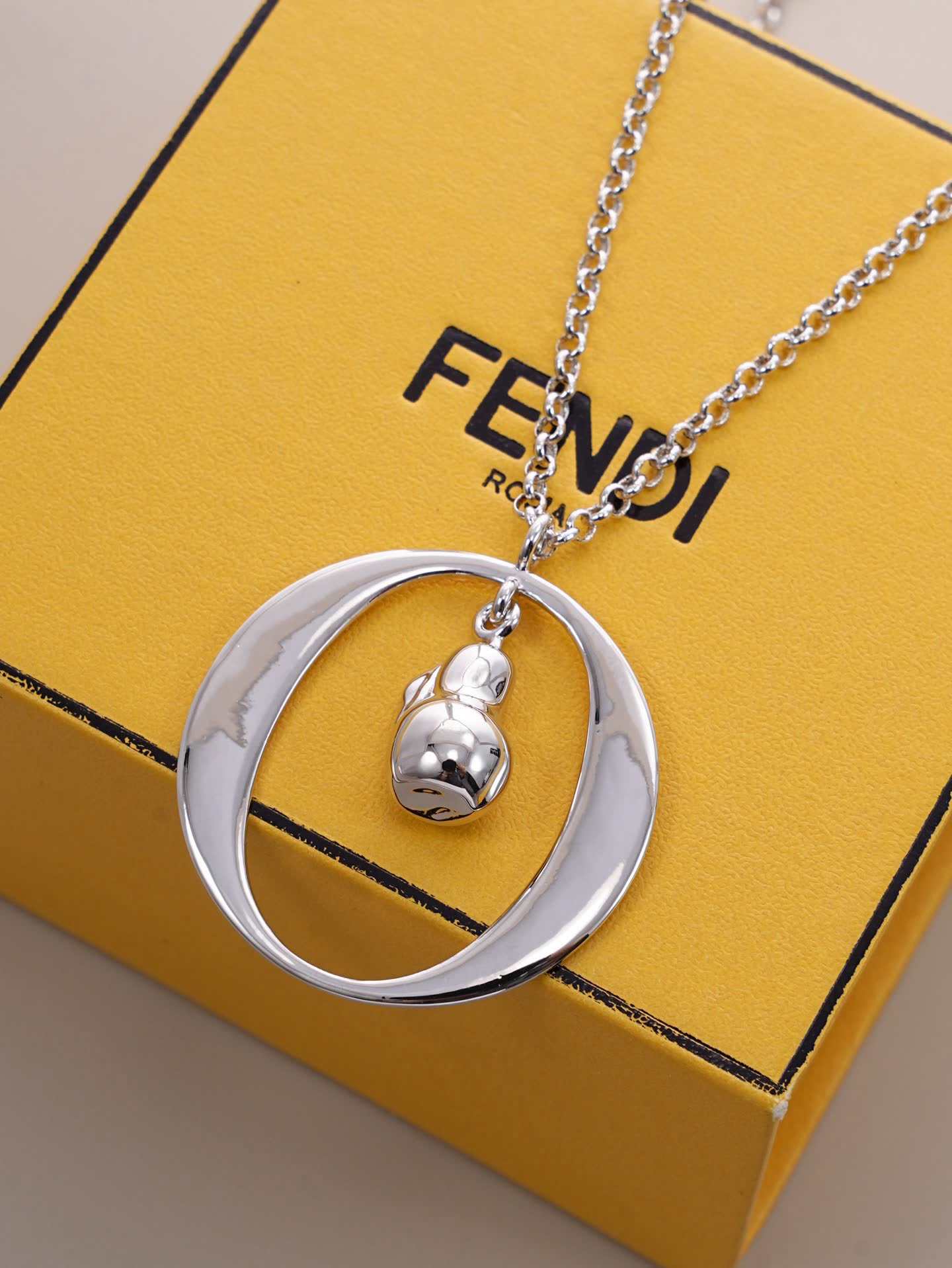 Fendi Silver 'bentvolve' Necklace with Logo Charm