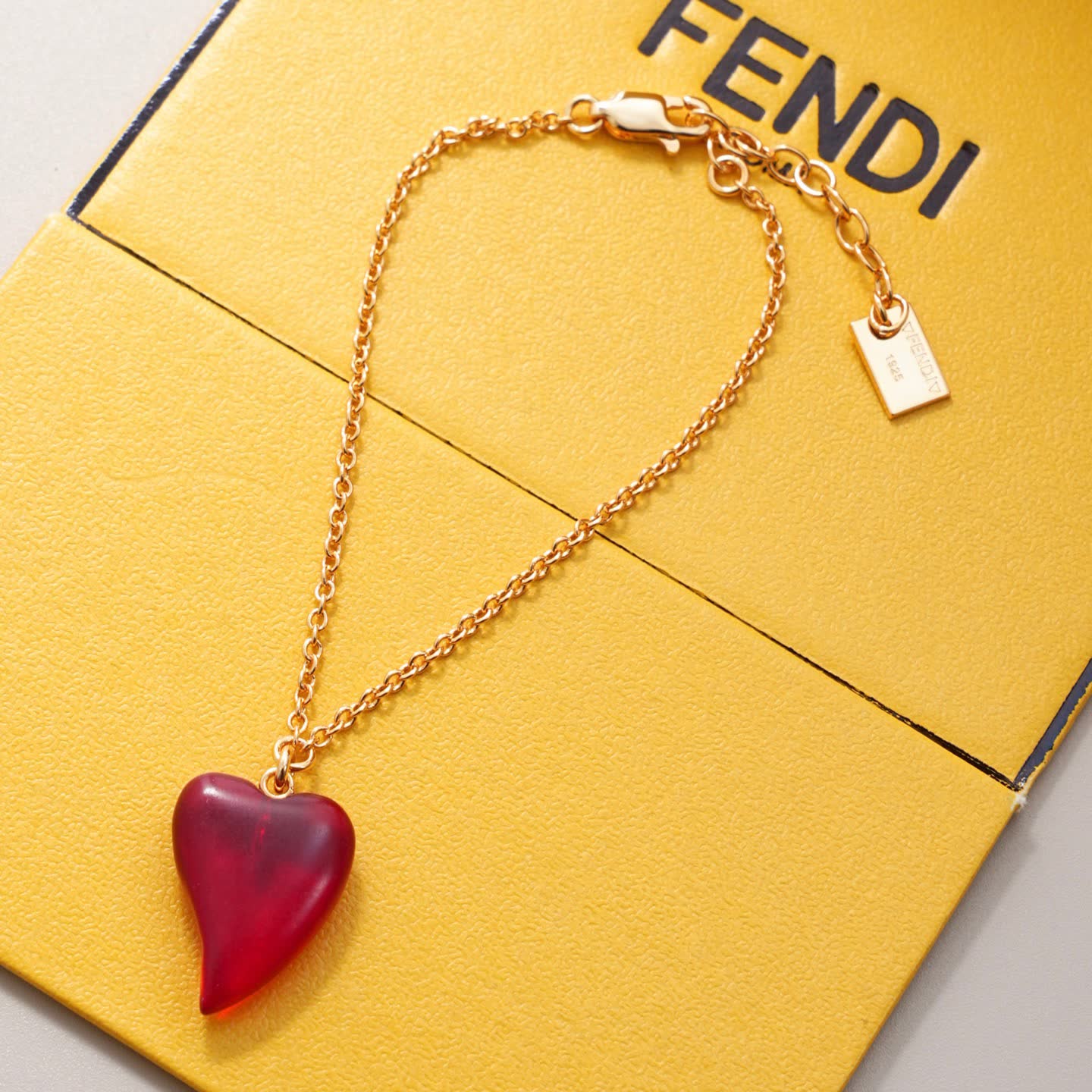 Fendi Gold Tone Red Heart Pendant Necklace