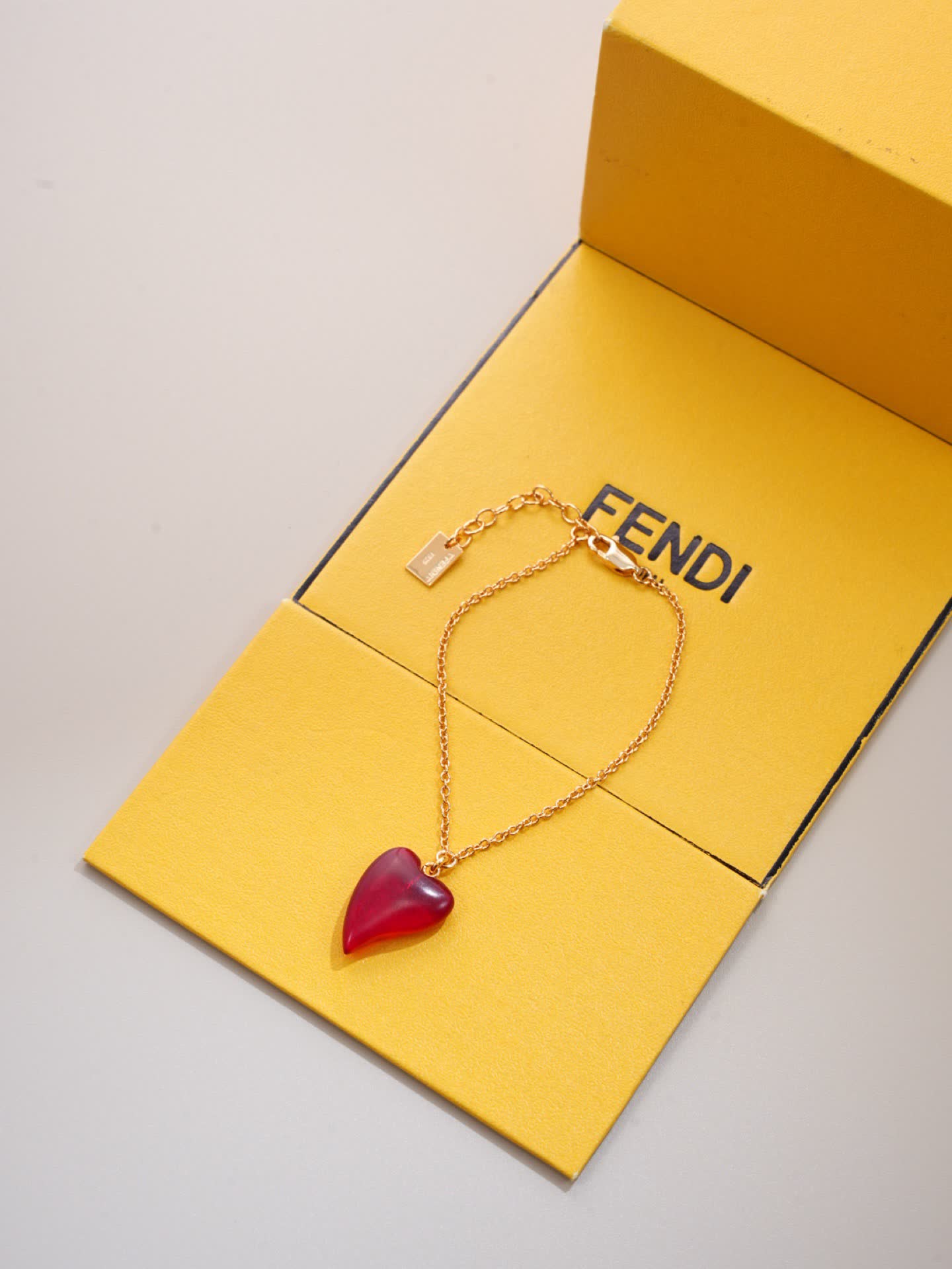 Fendi Gold Tone Red Heart Pendant Necklace
