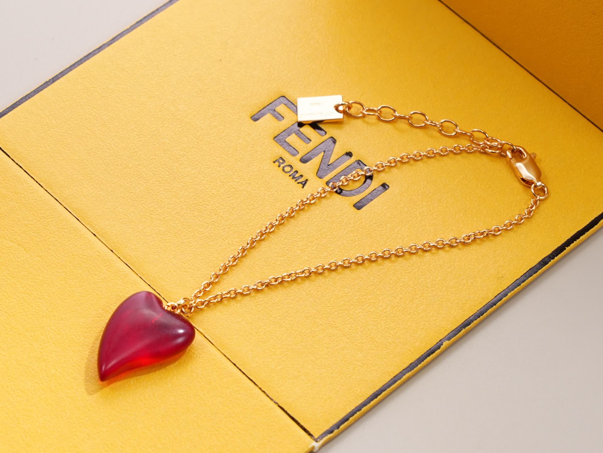 Fendi Gold Tone Red Heart Pendant Necklace