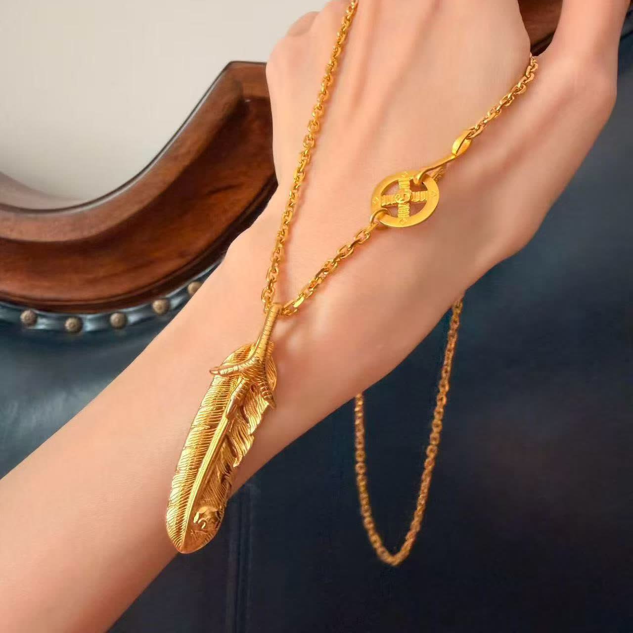 Goros Gold Feather Pendant Necklace