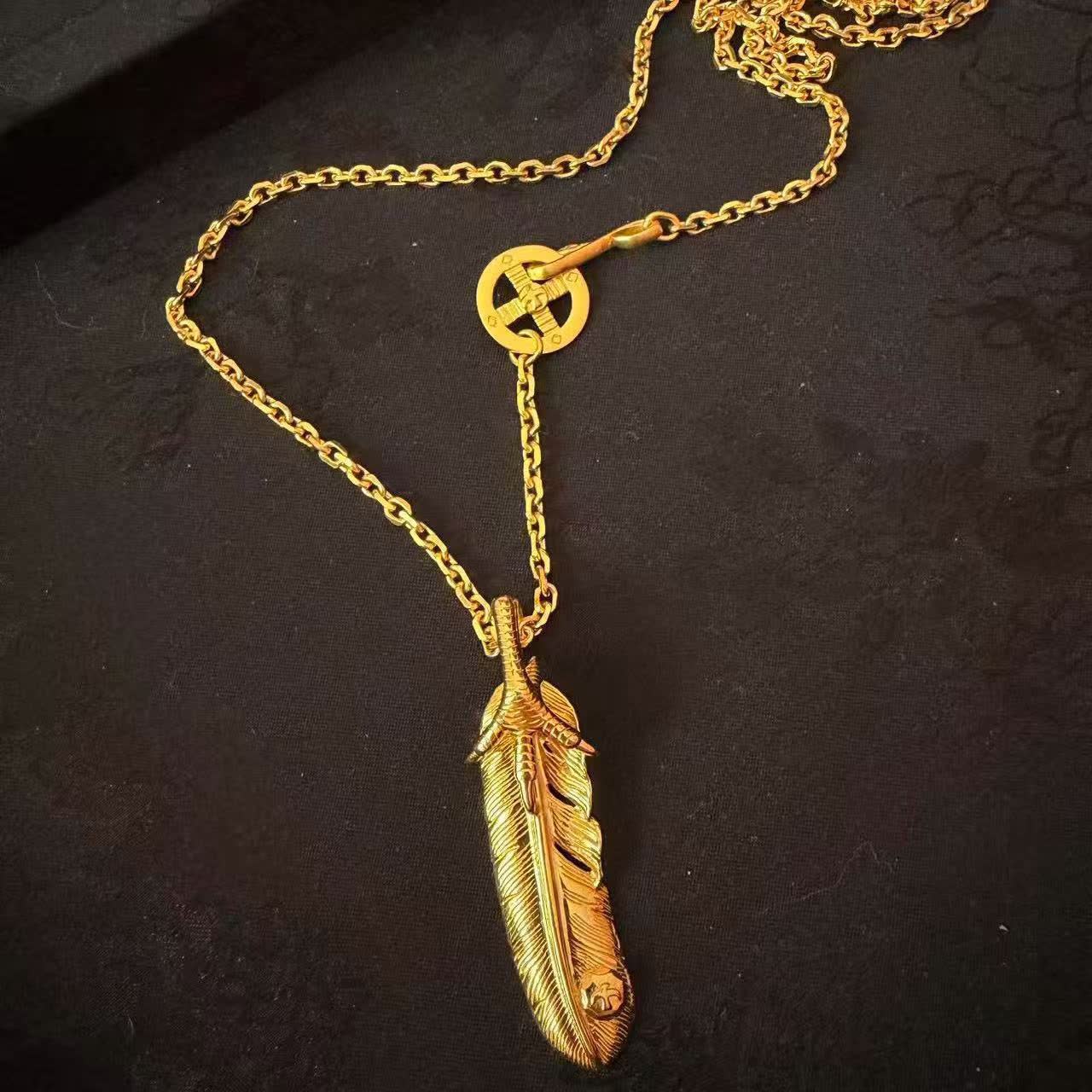 Goros Gold Feather Pendant Necklace