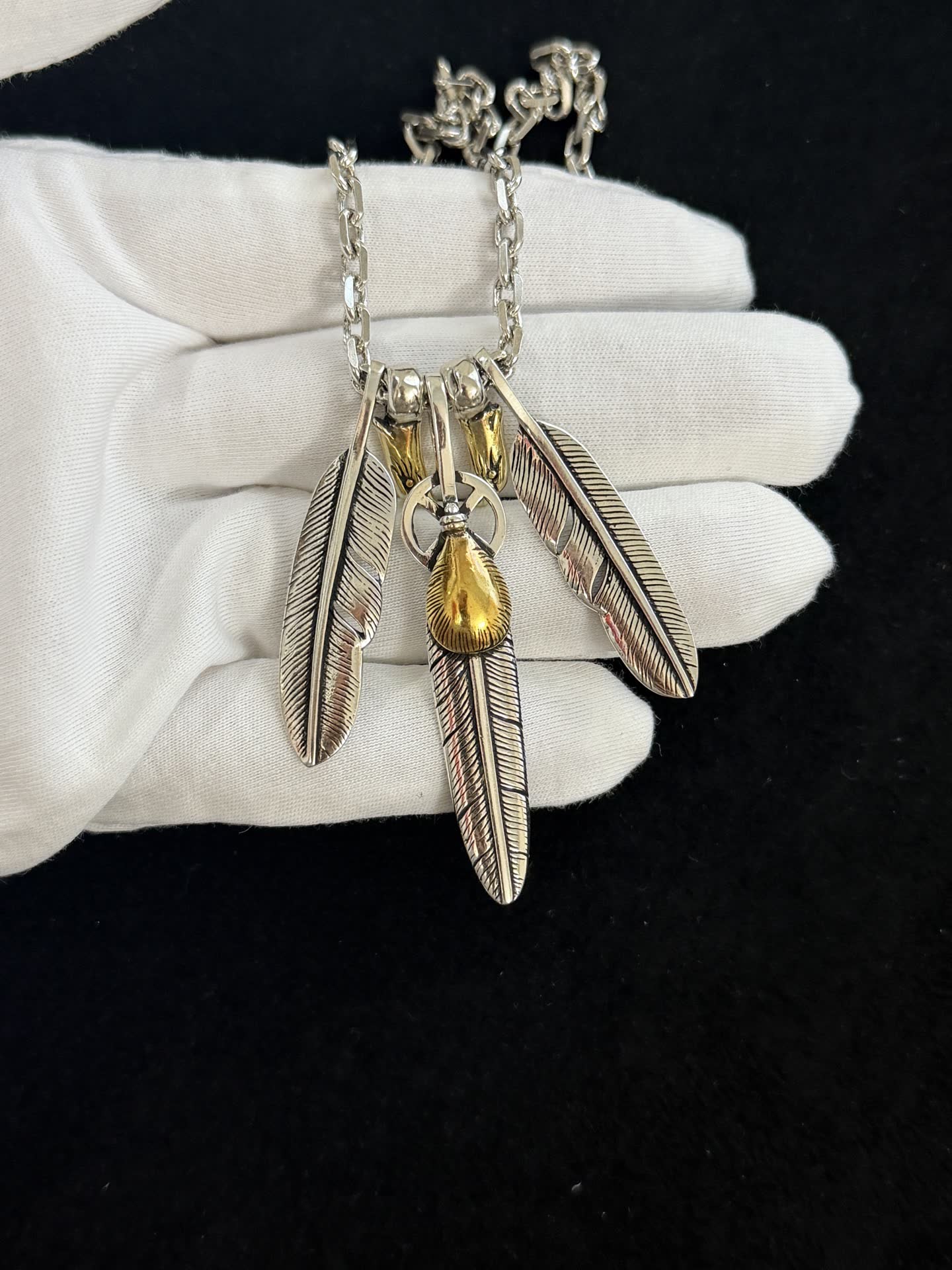 Goros Silver Feather Necklace with Gold Accents