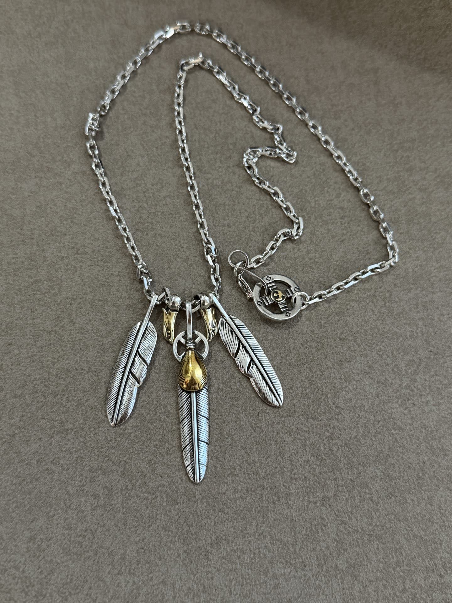 Goros Silver Feather Necklace with Gold Accents