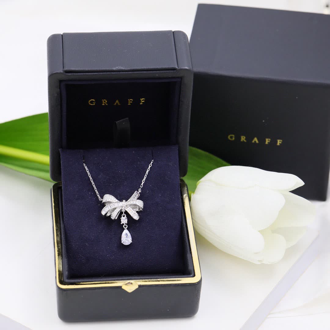 Graff Silver Bow Pendant with Diamond Accents