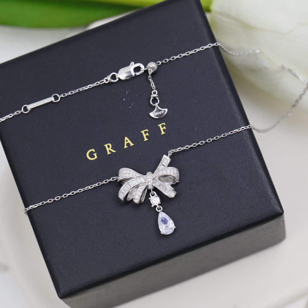 Graff Silver Bow Pendant with Diamond Accents