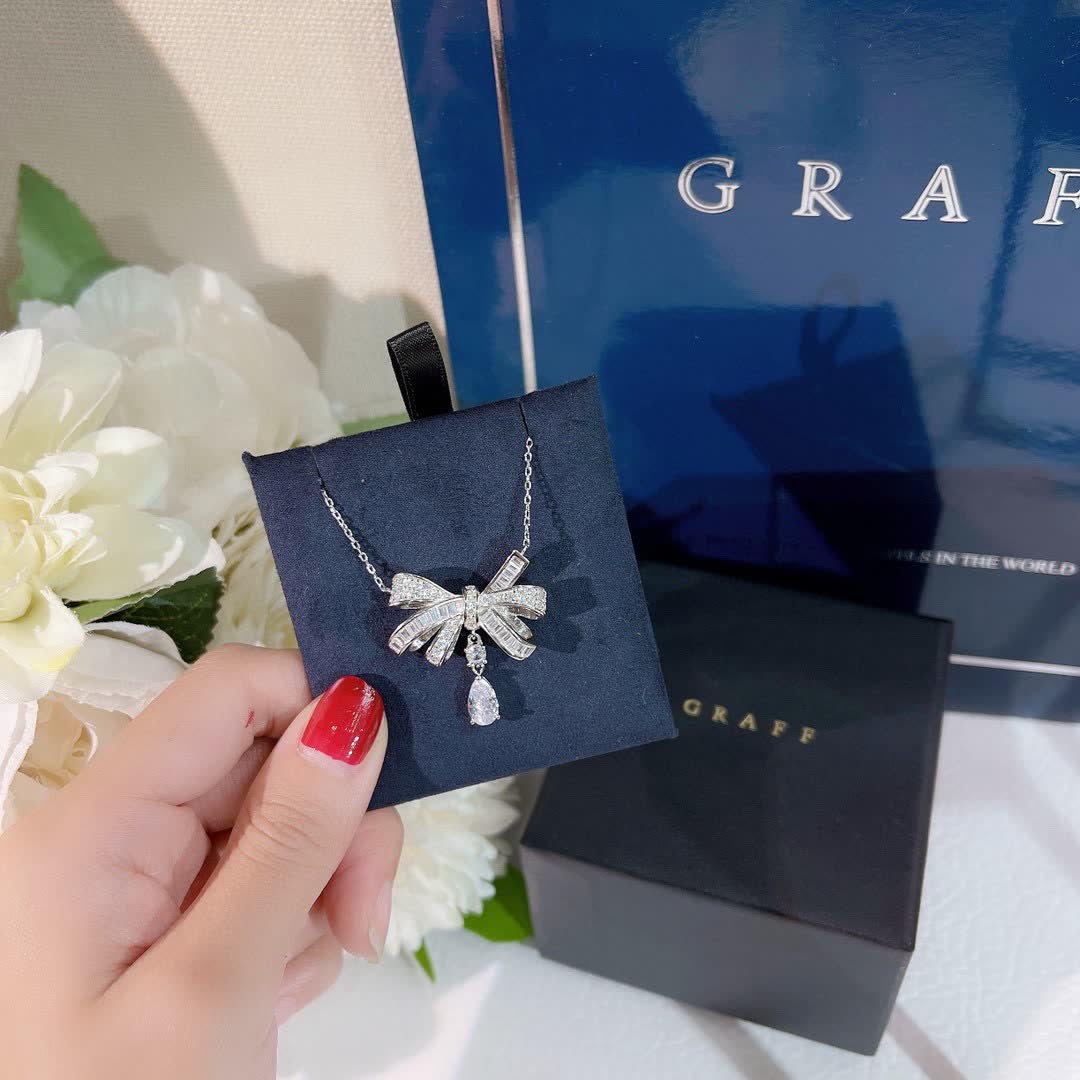 Graff Silver Bow Pendant with Diamond Accents