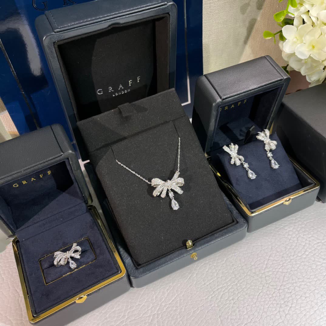 Graff Silver Bow Pendant with Diamond Accents