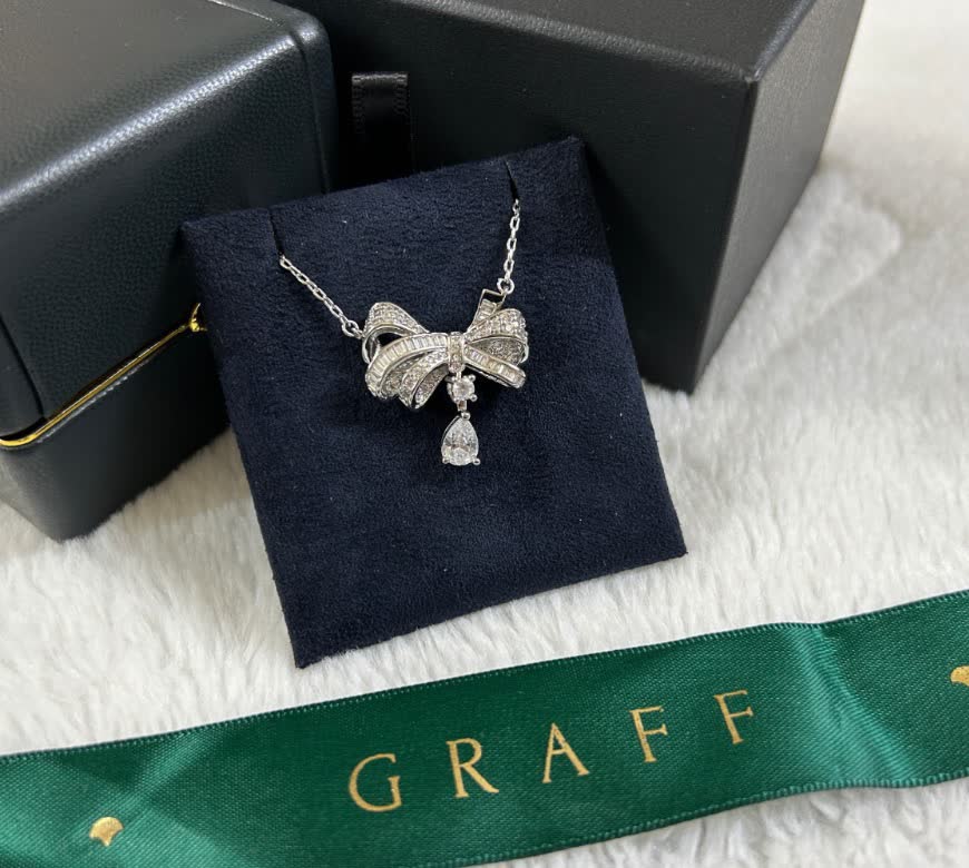Graff Silver Bow Pendant with Diamond Accents