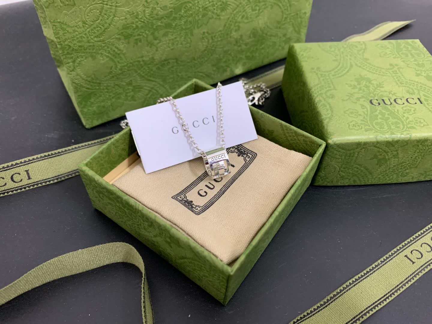 Gucci Silver Tone Logo Pendant Necklace