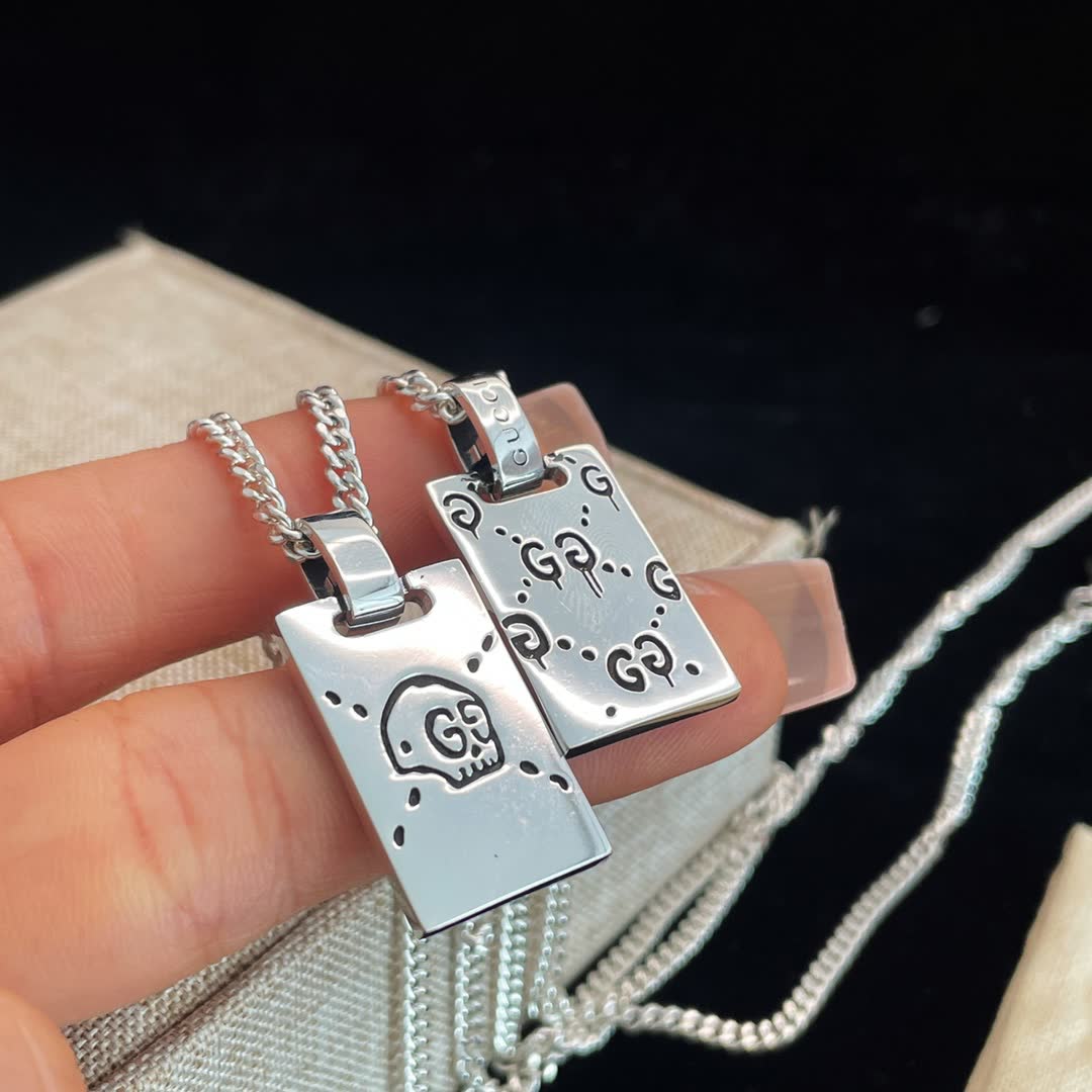 Gucci Silver Skull Tag Necklace