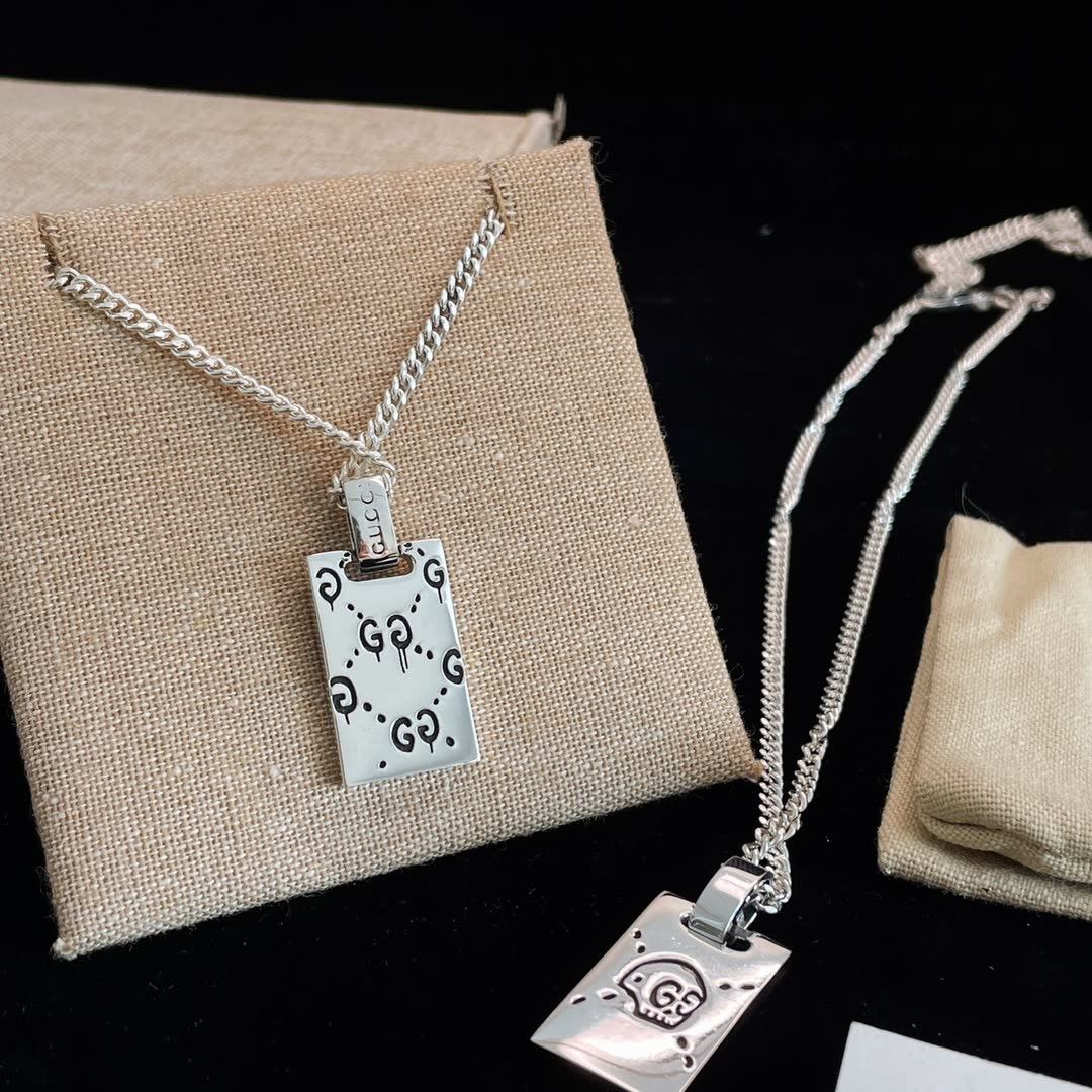 Gucci Silver Skull Tag Necklace